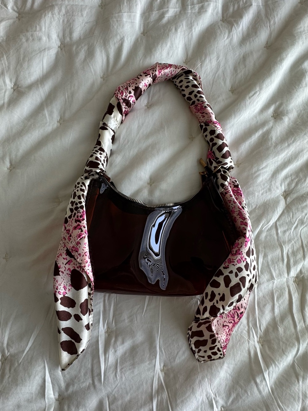 Stylish Brown Clear Shoulder Bag with Pink Animal-Print Scarf
